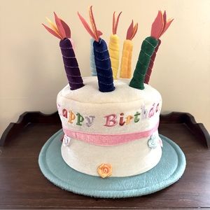Plush Happy Birthday Cake Hat Aqua Rim White a cake Pink Ribbon Flowers Candle